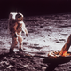 Astronaut Edwin “Buzz” Aldrin walks by the footpad of the Apollo 11 Lunar Module, July 1969.